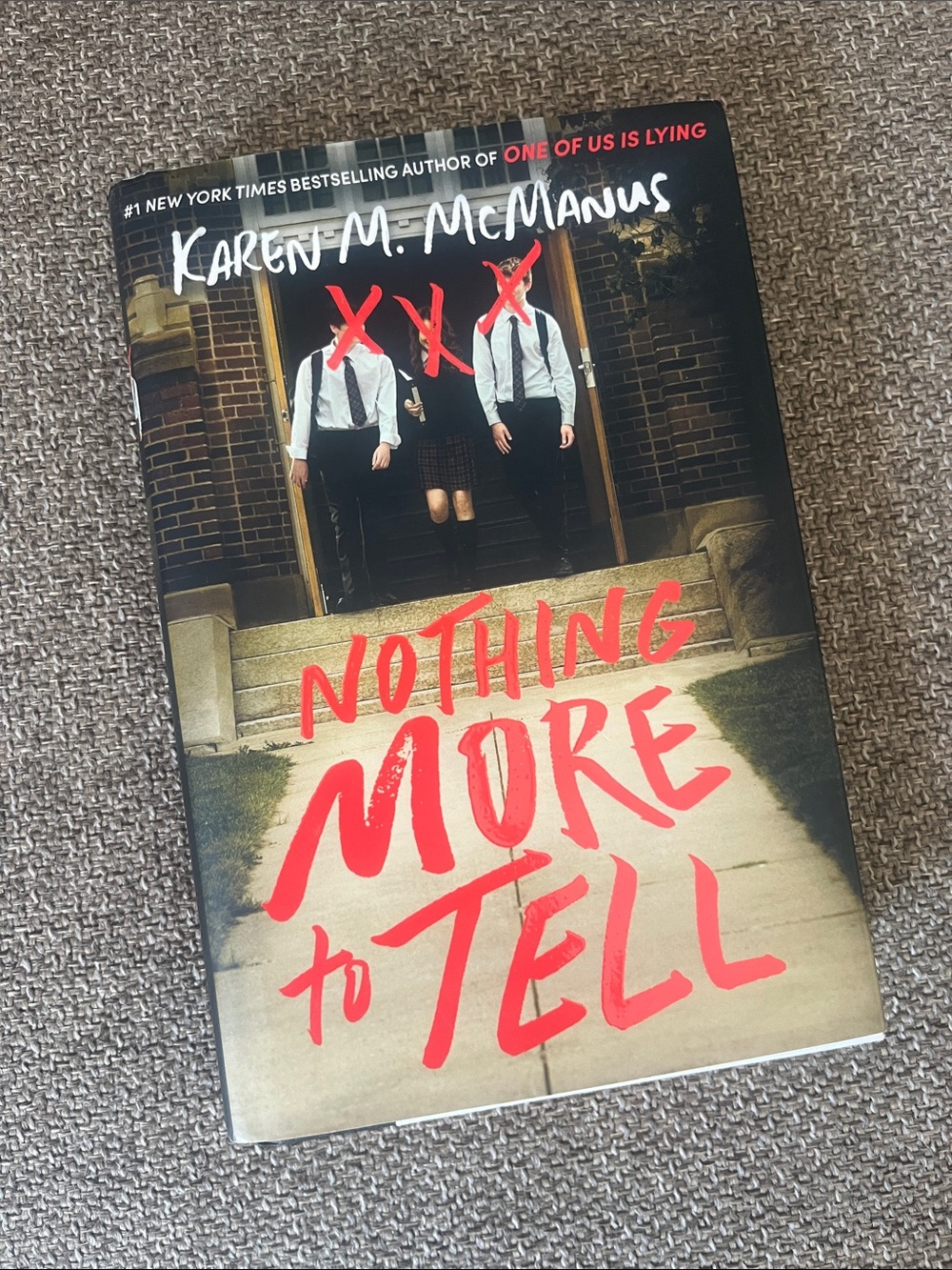 Nothing More to Tell by Karen M. McManus - Red & Black Hardcover
